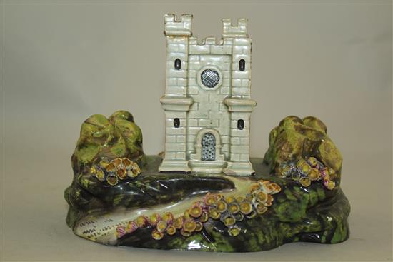 A rare Staffordshire pearlware model of a castle tower or hunting lodge, c.1820, 13.5cm